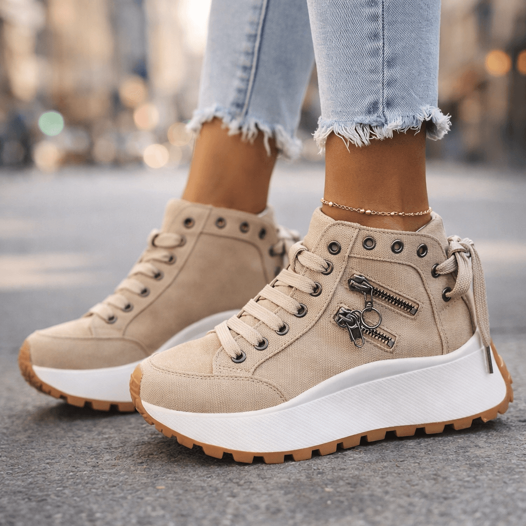 Zapatillas de mujer chunky con plataforma gruesa y cremalleras frontales. Estilo urbano casual y moderno.