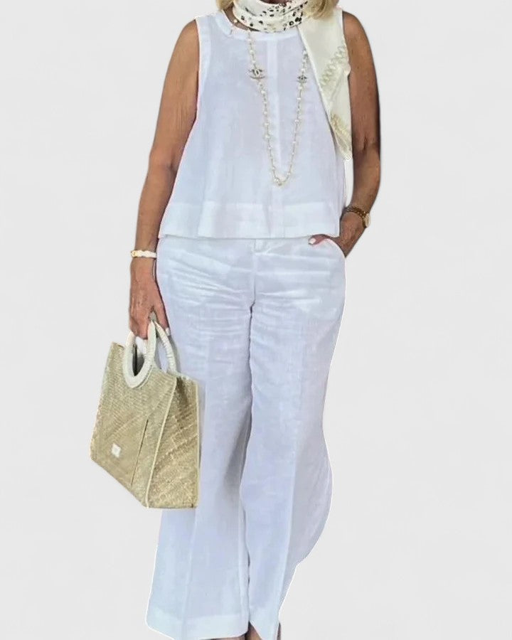 Conjunto cómodo de dos piezas para mujer, estilo loungewear casual. Ideal para relajarse, disponible en blanco, gris y negro.