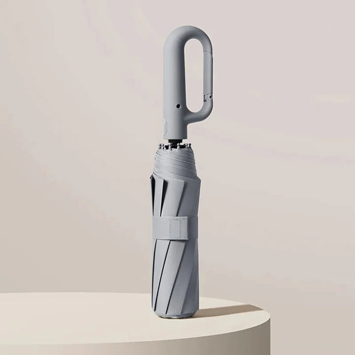 Paraguas reforzado y anti viento unisex, compacto y plegable, ofrece máxima protección UV UPF50+ para viaje.