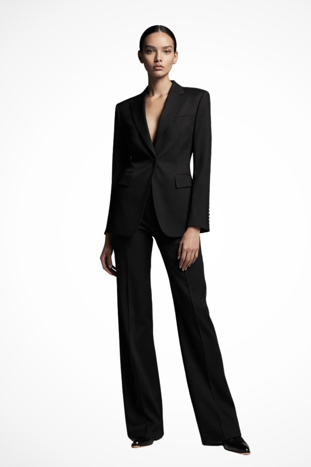 Traje femenino elegante con blazer y pantalón ancho, perfecto para un look profesional.
