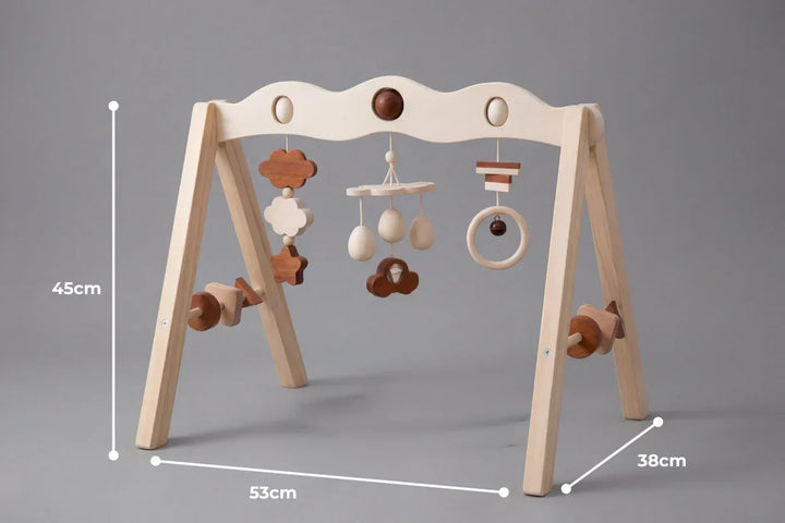 Gimnasio sensorial de madera, arco de actividades seguro y ecológico para la estimulación de bebés.