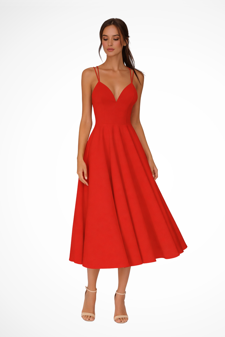 Vestido midi de invitada para mujer con tirantes finos y falda evasé, ideal para fiestas y eventos elegantes.