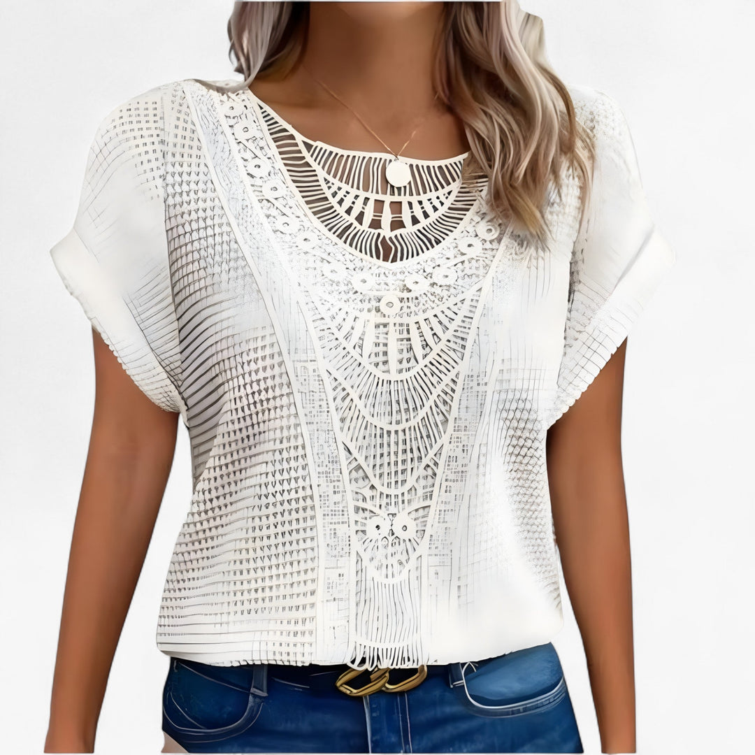 Top de encaje negro para mujer. Blusa elegante y sofisticada, estilo chic. Moda femenina.
