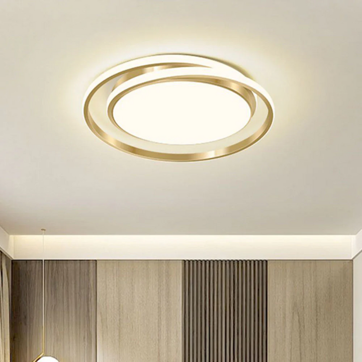 Luz LED de calidad en lámpara de techo moderna con forma de anillo, ideal para una iluminación hogareña eficiente.