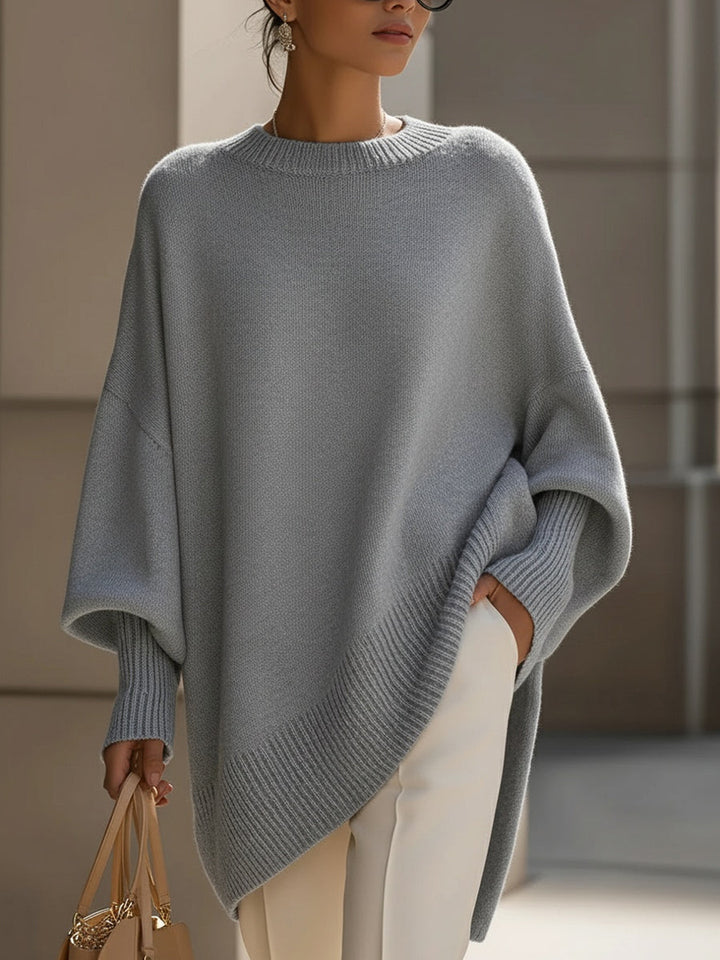 Poncho jersey de algodón oversize para mujer, diseño moderno y cómodo. Perfecto para el estilo de invierno.