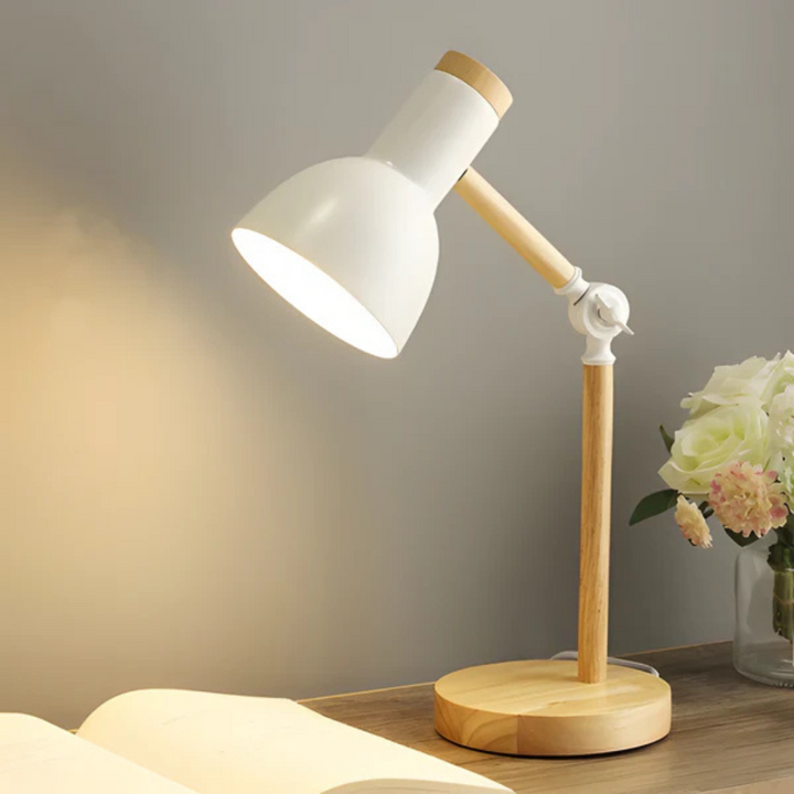 Lámpara de mesa LED giratoria moderna. Ideal para escritorio, oficina u hogar. Diseño elegante y luz cálida.
