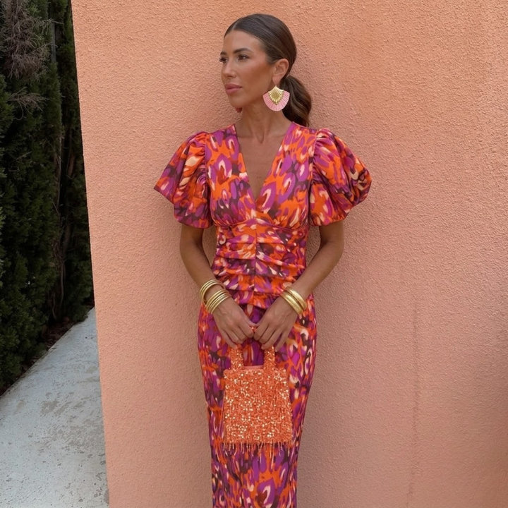 Vestido casual de primavera para mujer, con detalle de escote V y voluminosas mangas abullonadas.