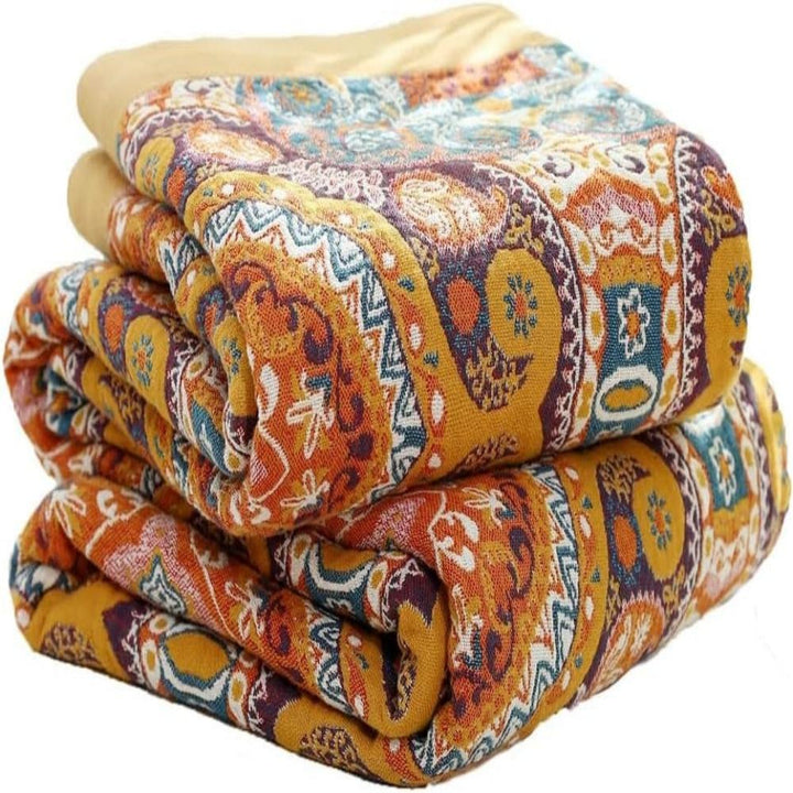 Manta de algodón reversible, estilo boho chic. Añade frescura y confort a tu dormitorio, ideal para decoración veraniega.