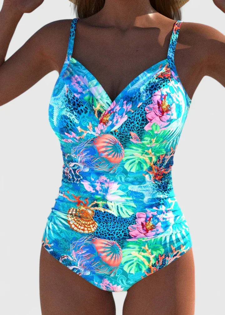 Traje de baño moldeador tropical para mujer con escote V. Estiliza tu figura en la playa o piscina este verano.