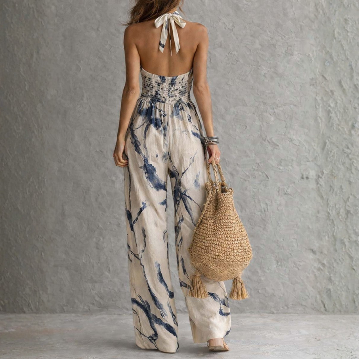 Mono de fiesta halter para mujer, estampado artístico. Diseño veraniego elegante con piernas anchas, muy cómodo.