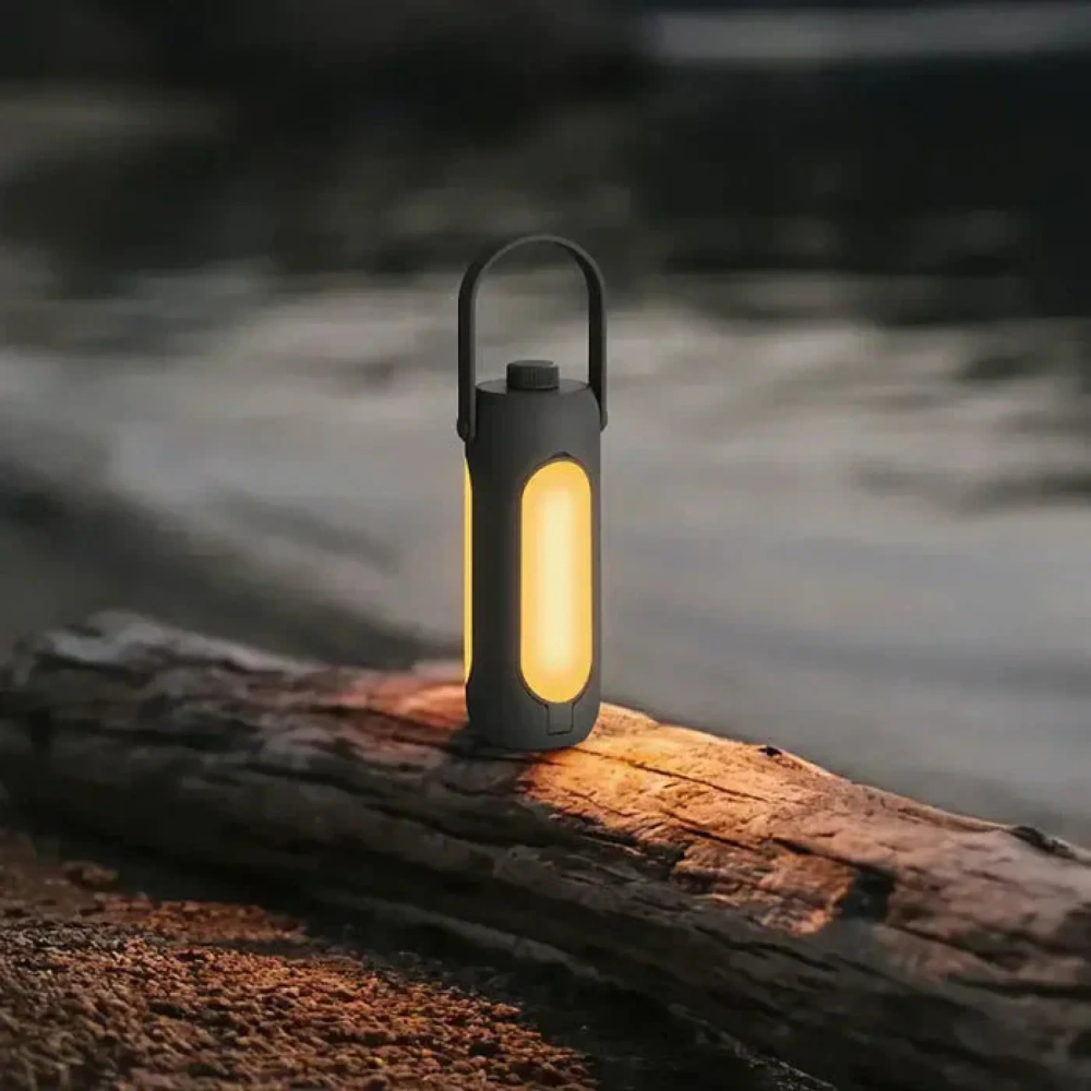 Lámpara LED multimodal recargable, portátil para exteriores, iluminación cálida para cualquier aventura.