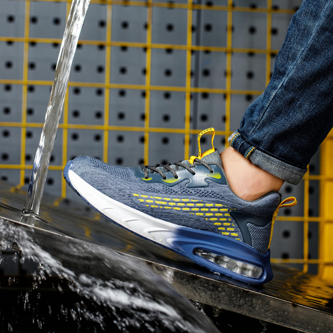 Zapatillas de seguridad para hombre, ligeras y cómodas con puntera de acero y suela antideslizante.
