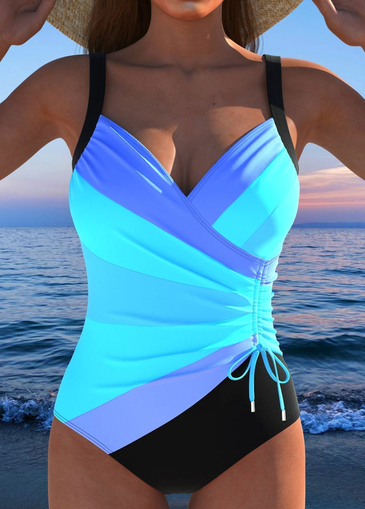 Bañador de mujer con diseño cruzado y fruncido para máximo realce y comodidad en tus días de verano.