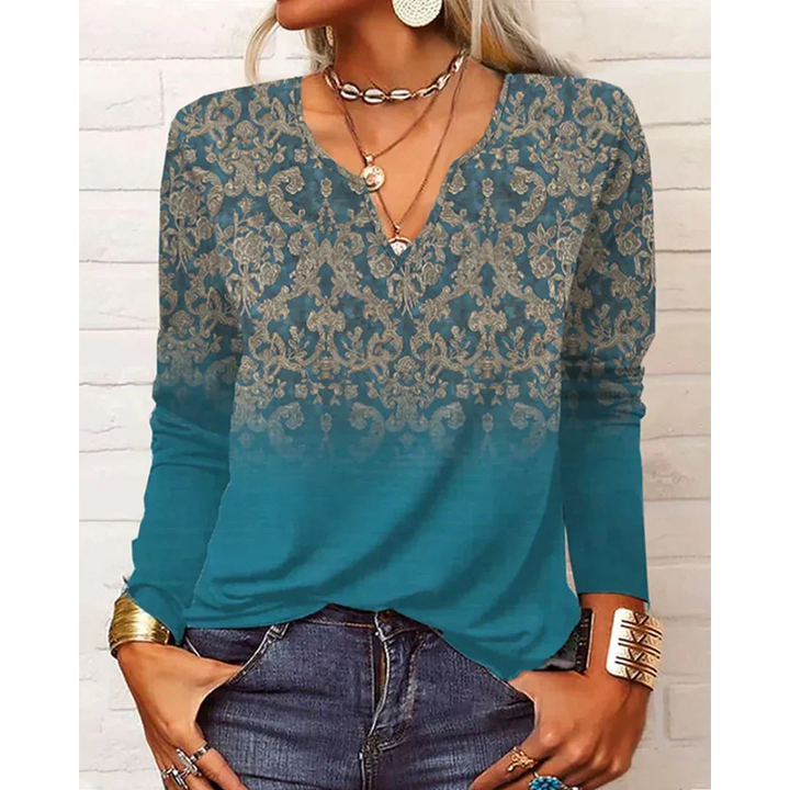 Blusa de mujer bohemia multicolor, manga larga. Perfecta para un look versátil y de moda femenina casual.