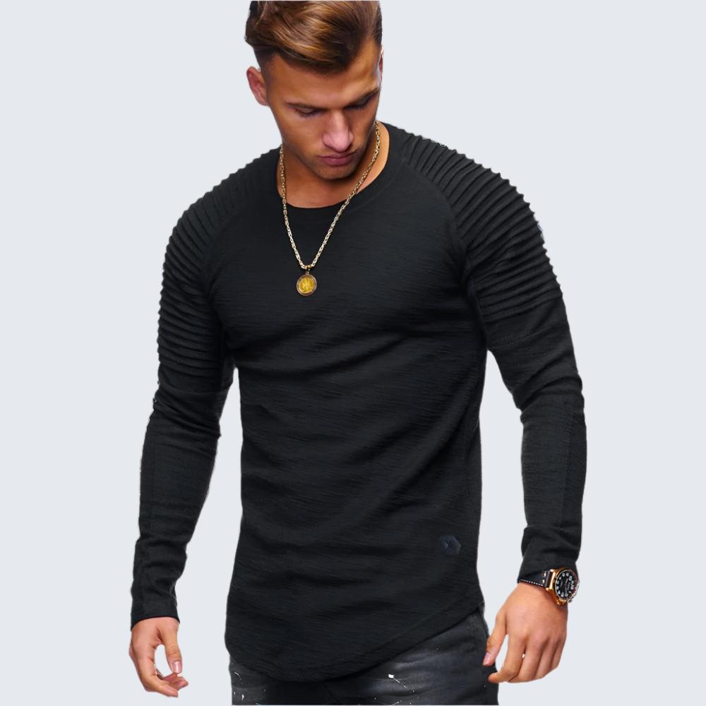 Jersey de canalé suave para hombre, manga larga y cuello redondo. Estilo versátil para otoño e invierno.