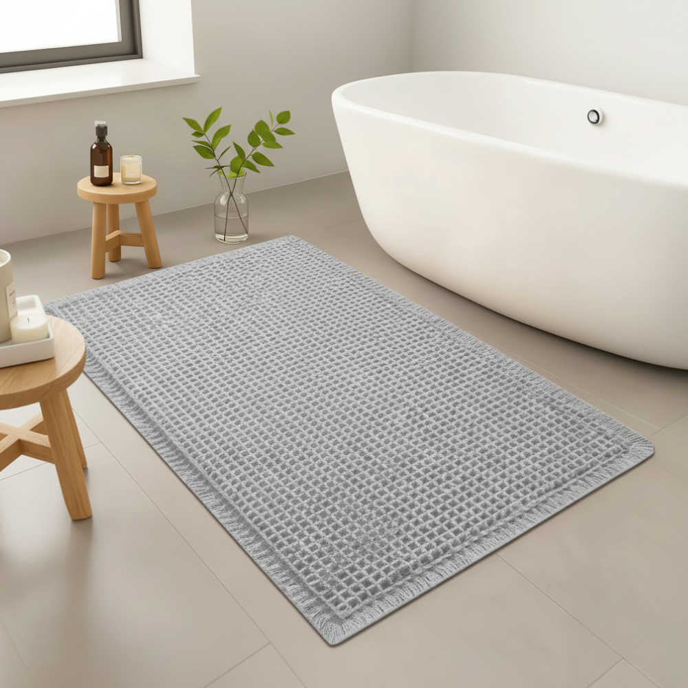 Alfombra de baño diseño waffle y borlas. Súper absorbente, lavable a máquina, antideslizante.