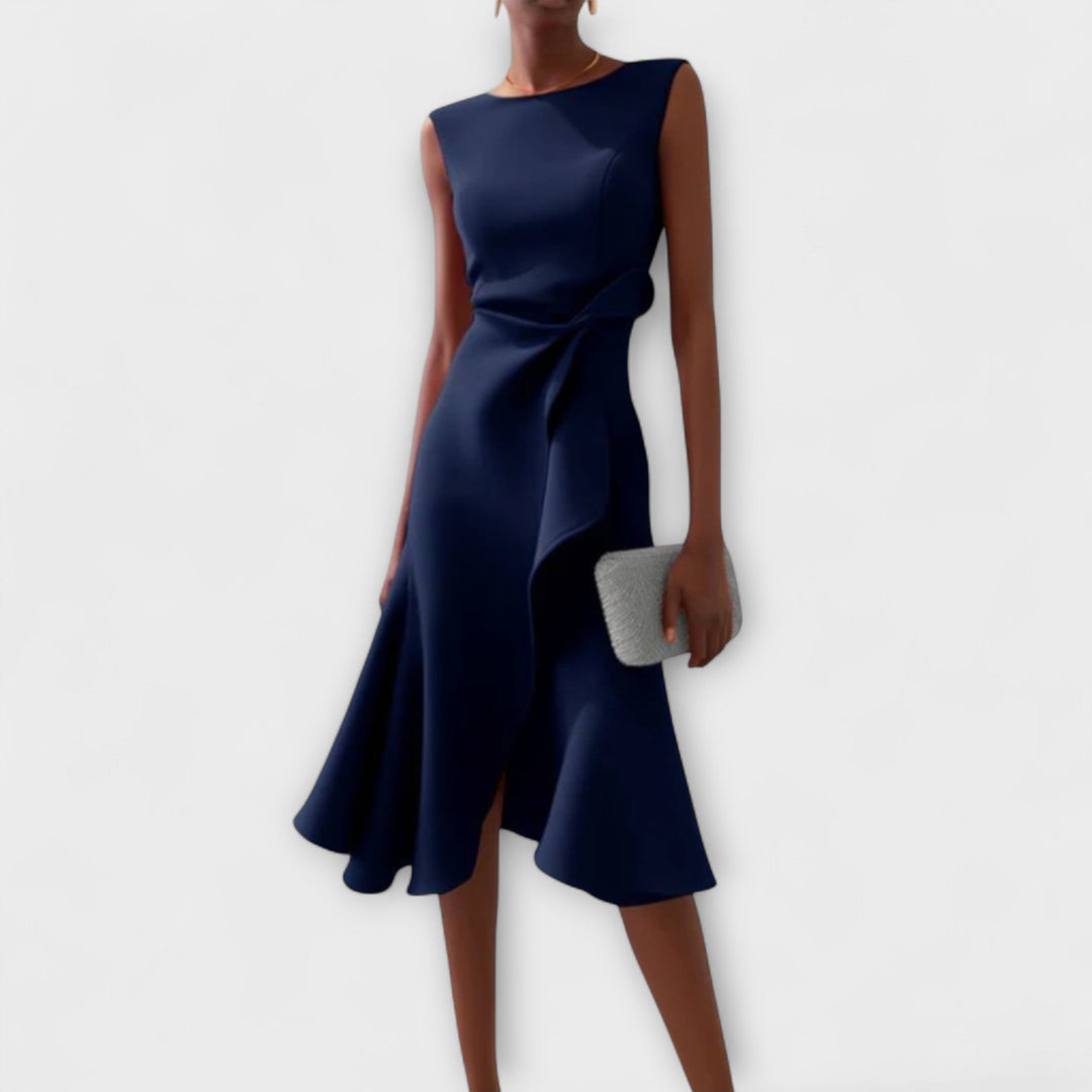 Vestido midi elegante y versátil para mujer, sin mangas con falda vuelo, moda ideal para fiesta.