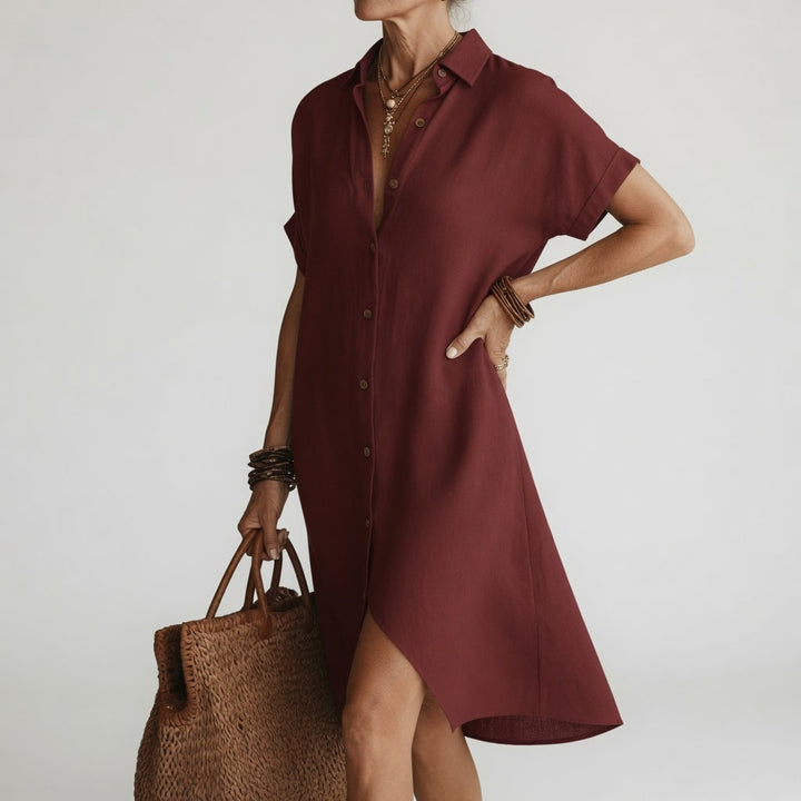 Elegante vestido camisero midi para mujer. Combina confort y versatilidad en esta prenda de moda femenina.