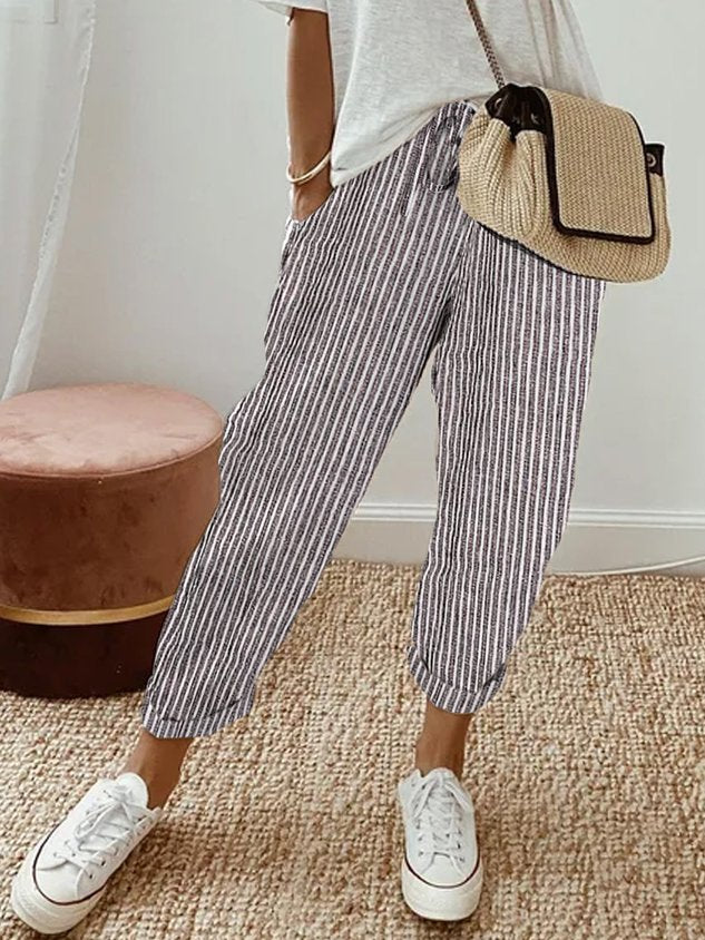 Confort diario asegurado con pantalón fluido Inés para mujer, tejido transpirable, cintura elástica.