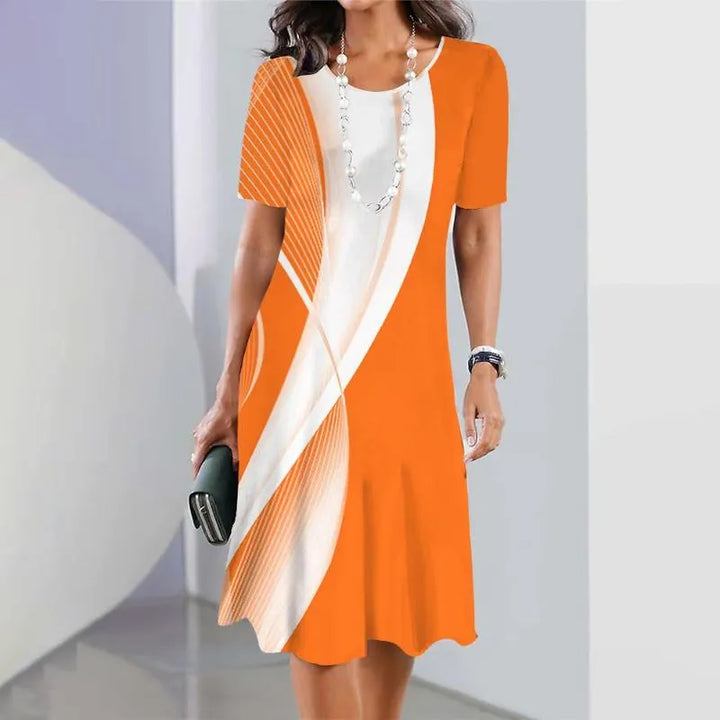 Vestido midi corte A estampado para mujer, mangas cortas. Estilo fresco y cómodo, perfecto para verano.