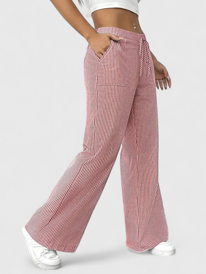 Pantalón gris de pierna ancha para mujer, transpirable y cómodo. Ideal moda de verano.