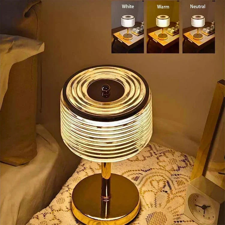 Lámpara de mesa Cirvella LED para decoración moderna. Ofrece luz cálida, neutra o blanca. Vidrio y dorado elegantes.