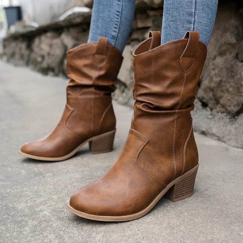 Botas elegantes de mujer, estilo atemporal, perfectas para moda otoño-invierno.