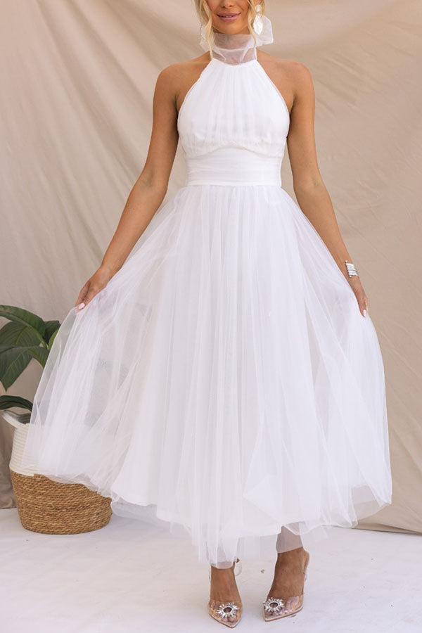 Vestido de mujer para ocasiones especiales, estilo midi halter y falda voluminosa.
