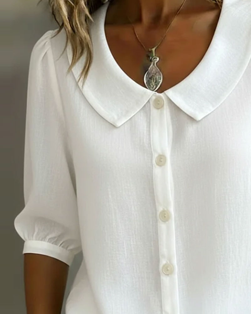 Camisa mujer cuello Peter Pan manga fluida. Estilo casual y versátil, perfecta para la moda de primavera/verano.