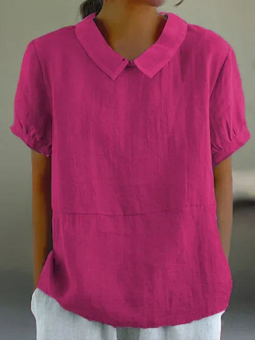 Blusa fluida de cuello alto para mujer, estilo relajado. Ideal para oficina o look casual de verano.