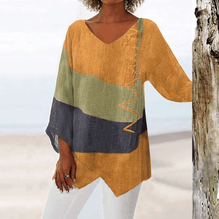 Blusa moderna para mujer con diseño geométrico y estilo elegante. Versátil, cómoda, ideal para look casual de verano.