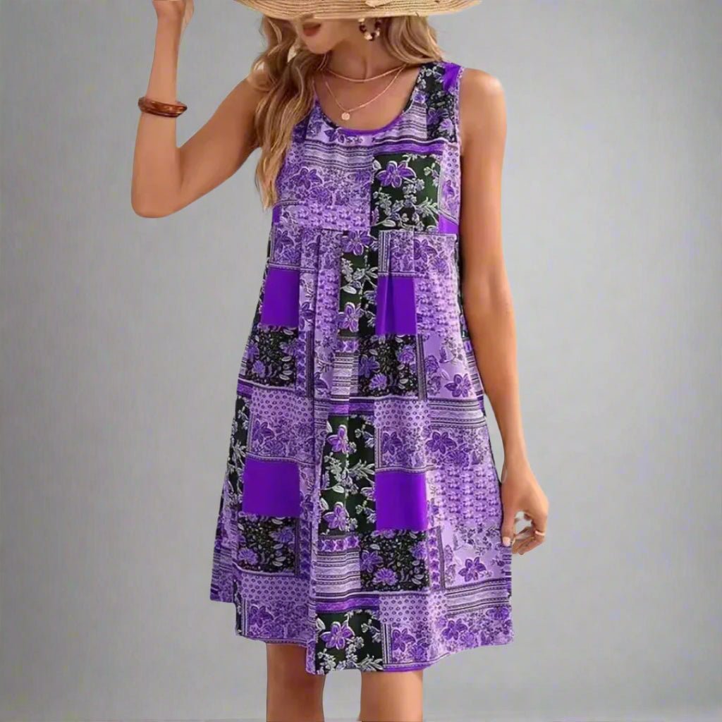 Vestido de mujer mini bohemio sin mangas, con diseño fresco y estampado de moda. Ideal para el verano.