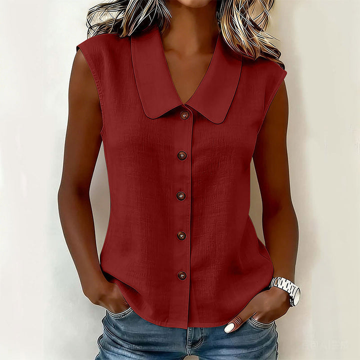 Blusa casual chic sin mangas con un escote pronunciado en V, ideal para un look veraniego fresco.