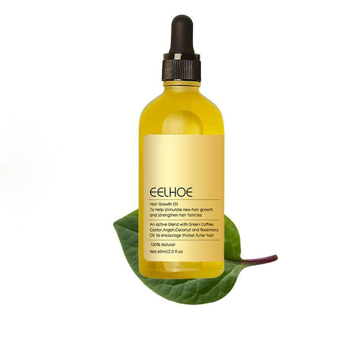 Mujer aplicando aceite capilar natural para engrosar el cabello y combatir la caída. Salud del cuero cabelludo.