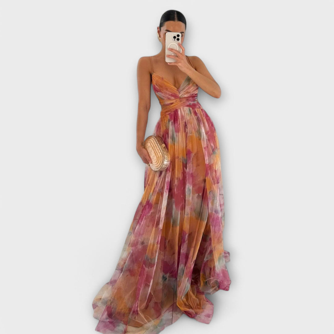 Vestido maxi floral degradado fluido para mujer, ideal para fiesta o evento de verano con estilo bohemio.