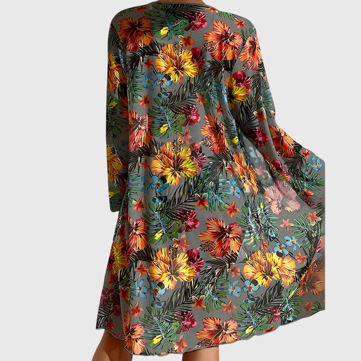 Vista frontal de bikini de mujer 3 piezas tropical: top lazo, braga cintura alta y kimono floral.