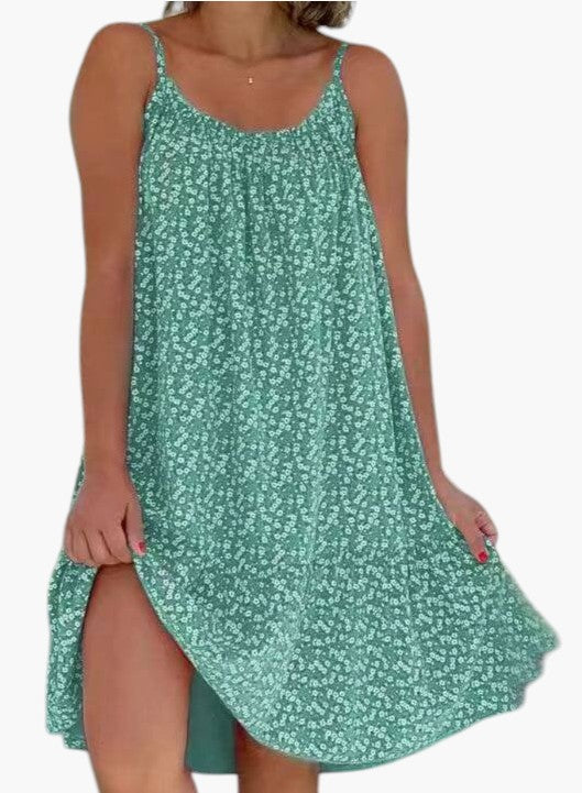 Vestido de mujer, estampado, ligero y fluido. Perfecto para el verano, vacaciones o un look casual y elegante.