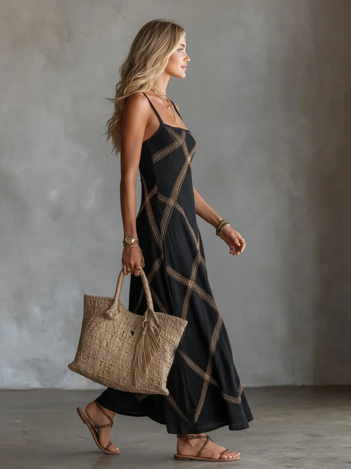 Vestido largo de tirantes para mujer con estampado geométrico. Look elegante y fresco para moda de verano.