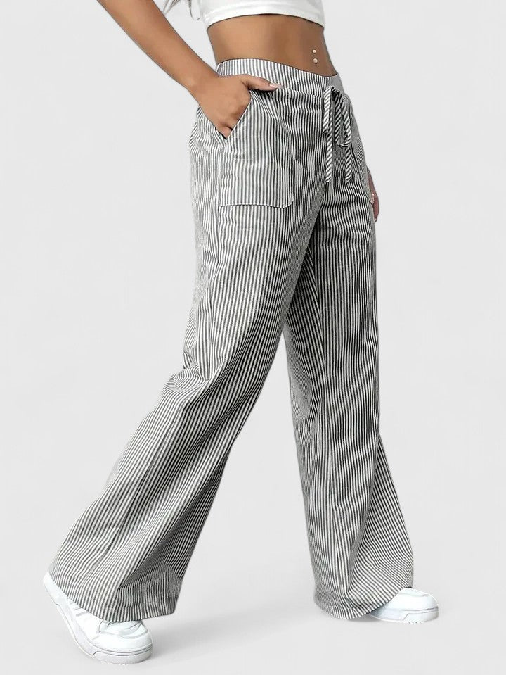 Pantalón ancho rosa fuerte de mujer, cintura ajustable. Estilo casual ideal para el verano.
