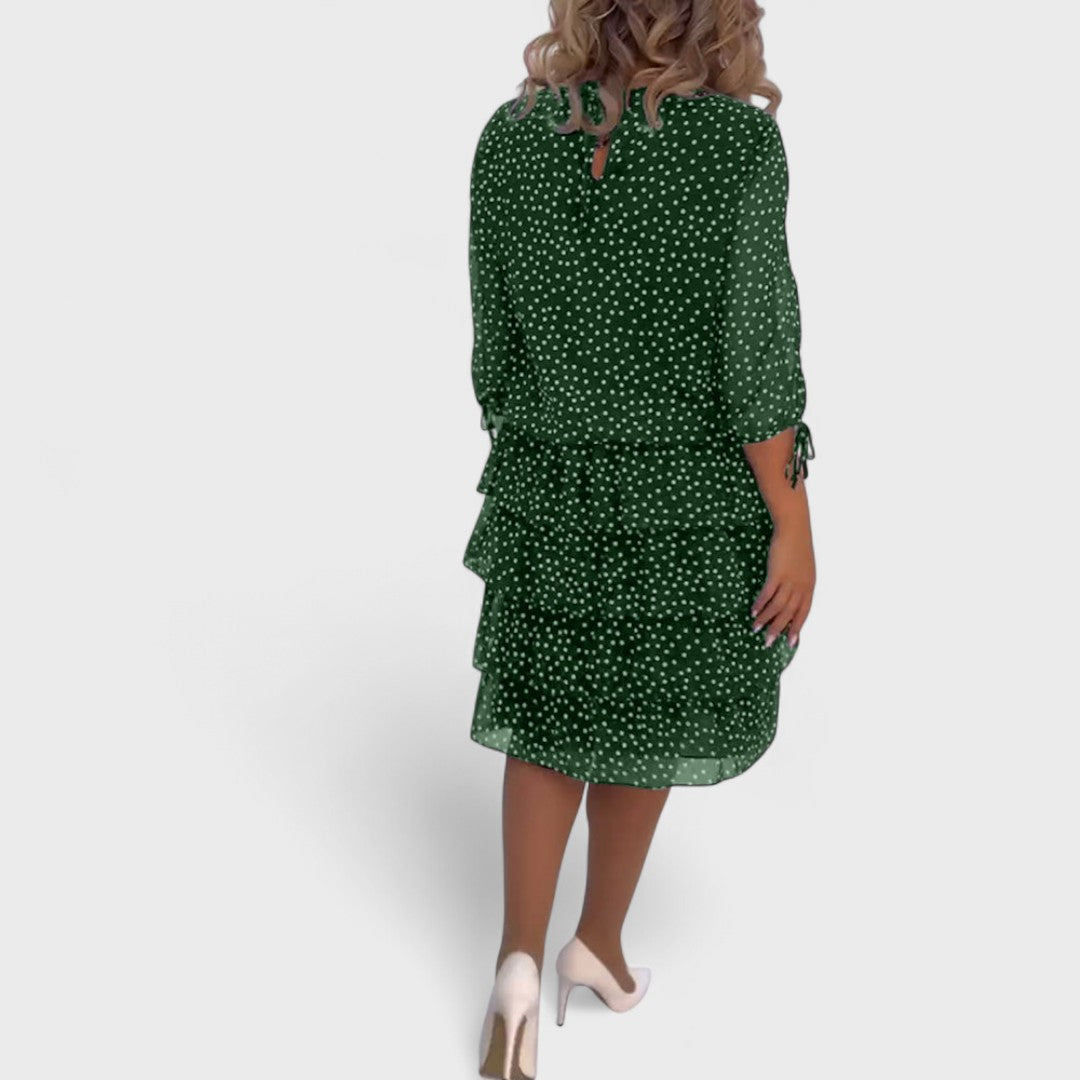 Vestido de lunares midi para mujer, manga 3/4, ideal para looks elegantes o casuales de primavera.