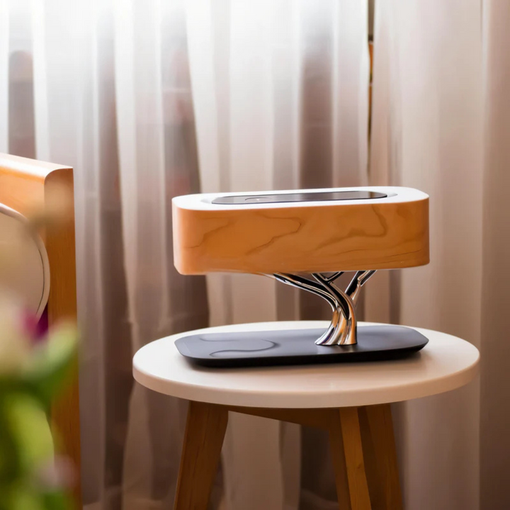 Lámpara de mesa inteligente con luz LED regulable, altavoz Bluetooth y carga inalámbrica Qi. Optimiza tu espacio.