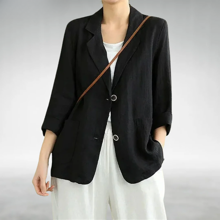 Blazer casual negro de mujer, prenda versátil para ropa de oficina y estilo relajado. Chaqueta moda femenina.