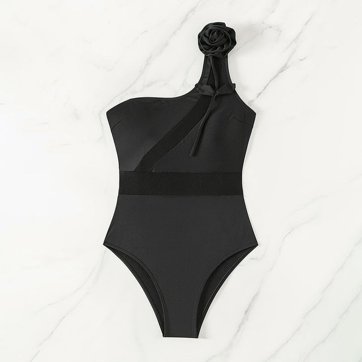 Traje de baño negro moldeador de un hombro para mujer, realza la figura, ideal para piscina y playa.