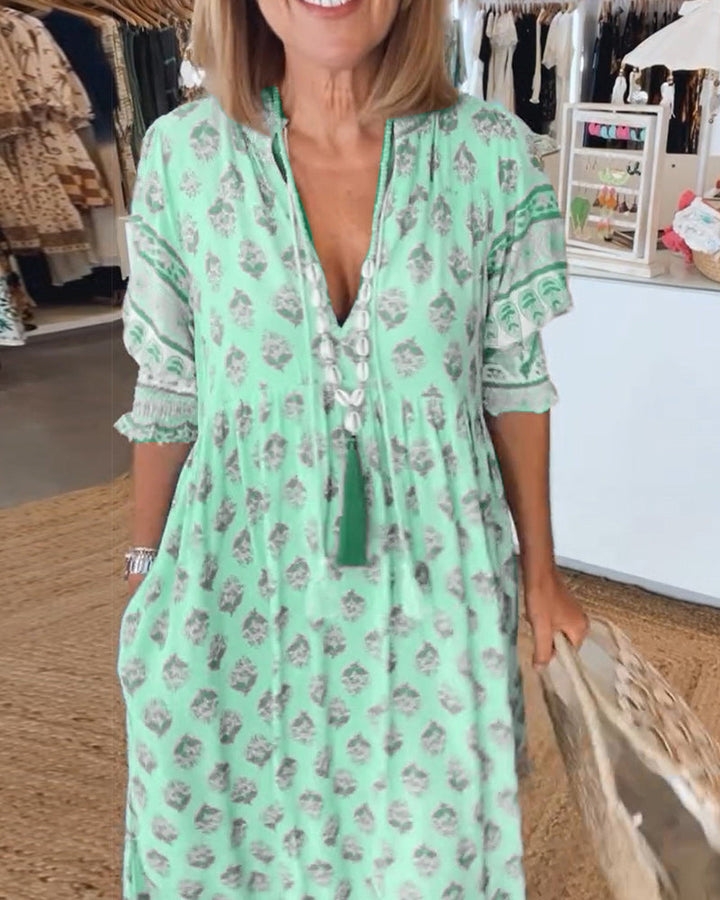 Elegante vestido maxi bohemio para mujer, con capas y escote en V. Perfecto para primavera.