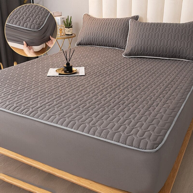 Protector de colchón premium, impermeable, acolchado y con superficie extrasuave para un descanso óptimo.