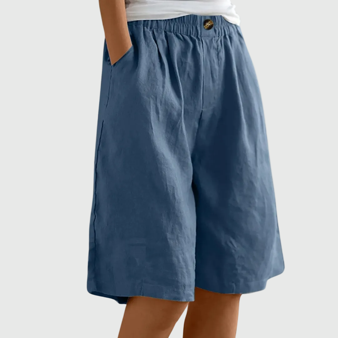 Shorts fluidos de mujer con cintura elástica. Cómodos y elegantes para un look de verano relajado.