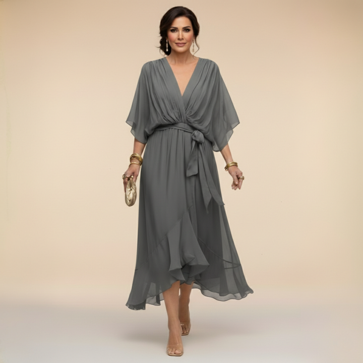 Vestido midi versátil para mujer, diseño elegante y fluido, con escote V y cintura ajustable. Ideal para cualquier ocasión.