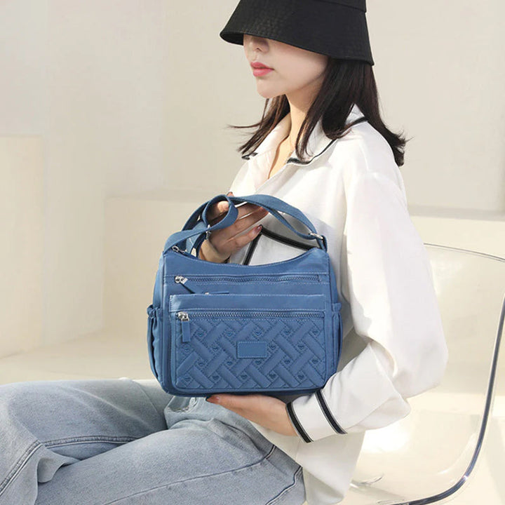 Bolso para mujer, diseño clásico y elegante, ideal para un look sofisticado en la oficina.