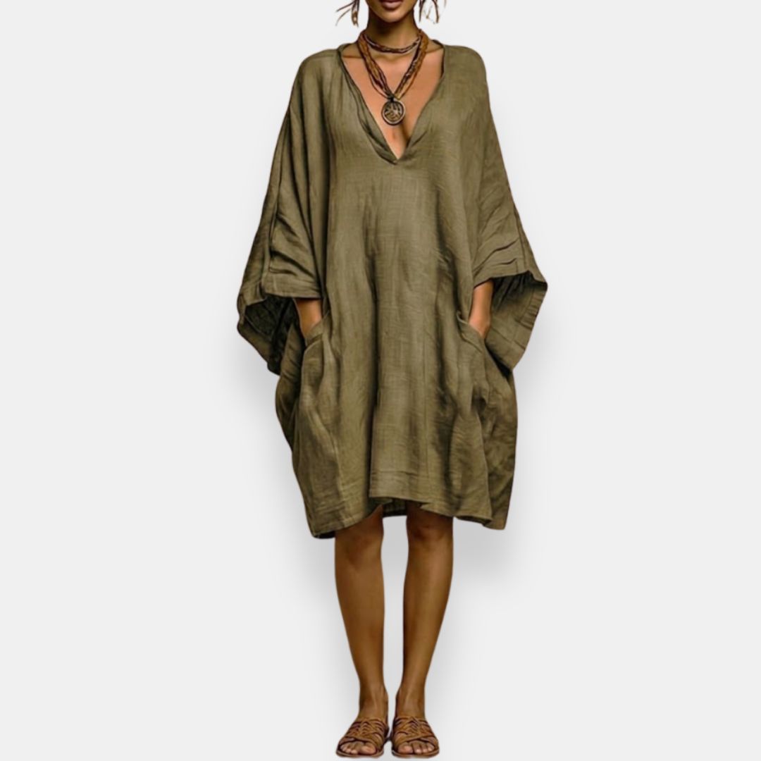 Vestido oversize bohemio de verano para mujer, con escote V y tela fluida. Máxima comodidad y estilo casual.