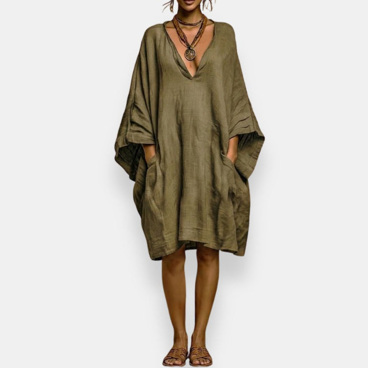 Vestido oversize bohemio de verano para mujer, con escote V y tela fluida. Máxima comodidad y estilo casual.